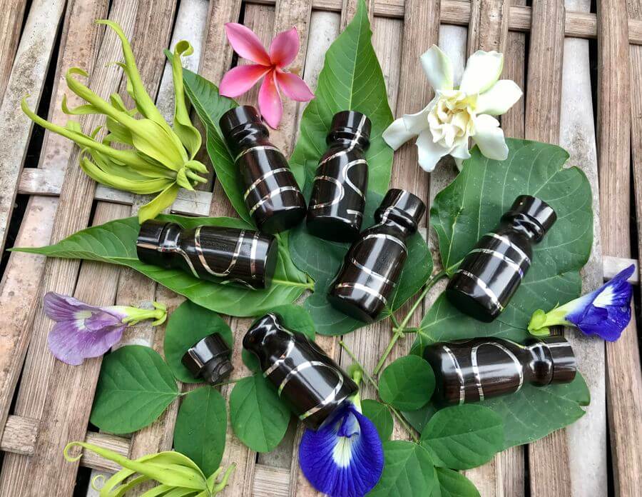 Storage bottles with silver line decoration, handcrafted from hardwood, wholesale option